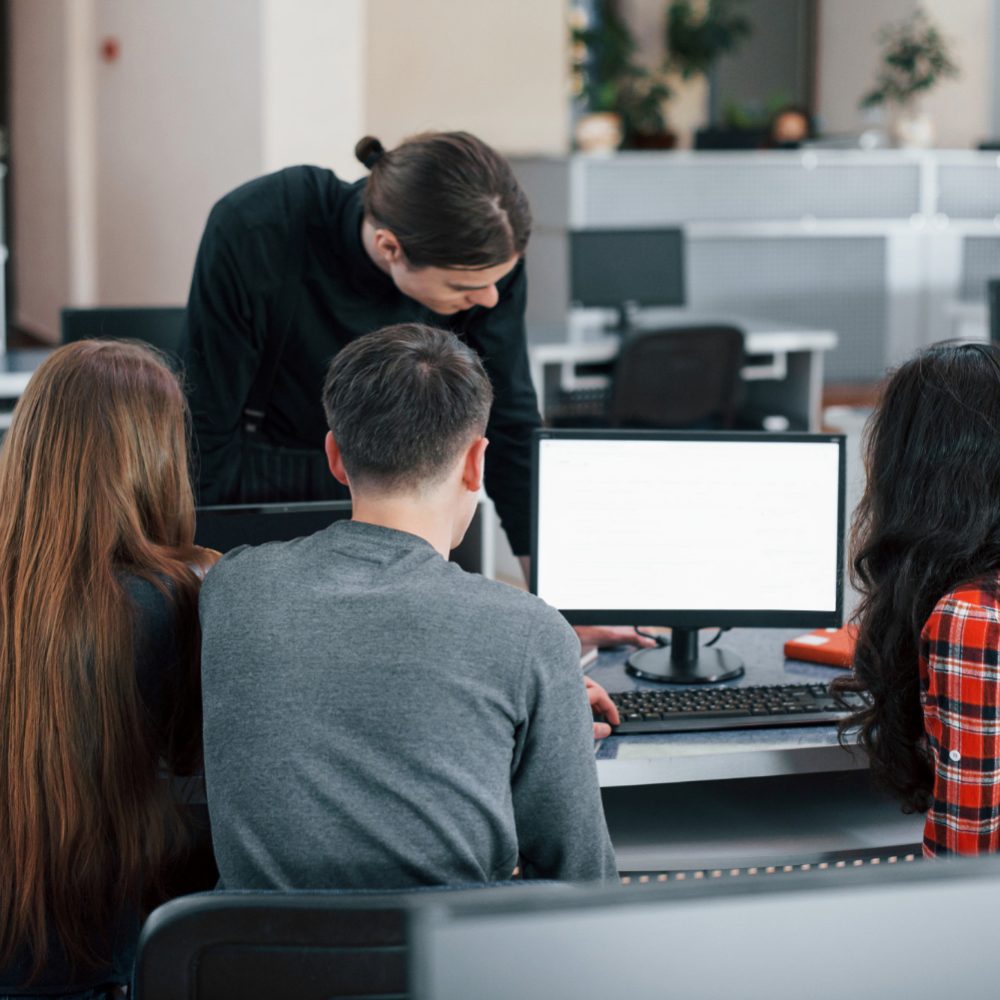 screen-with-white-color-put-your-text-there-group-young-people-casual-clothes-working-modern-office